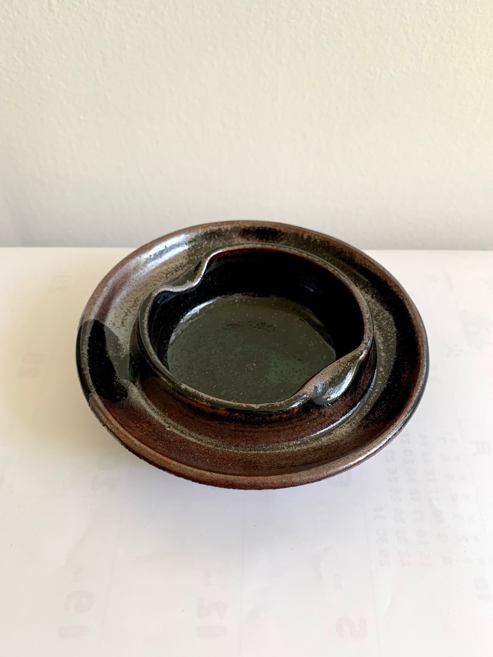 handmade dark red brown black glazed pottery circle pinched rim ashtray bowl